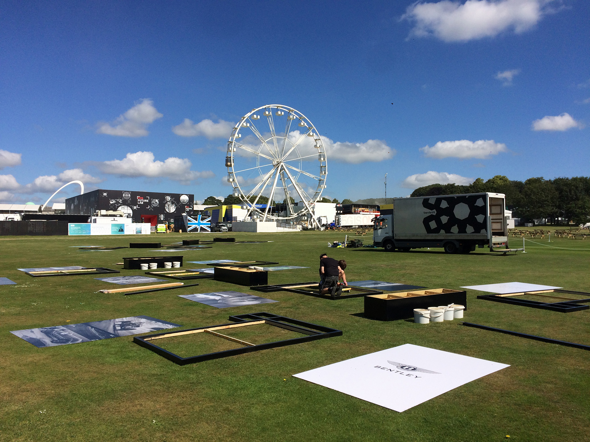 Standard8 team installing outdoor exhibition at Goodwood or the Festival of Speed